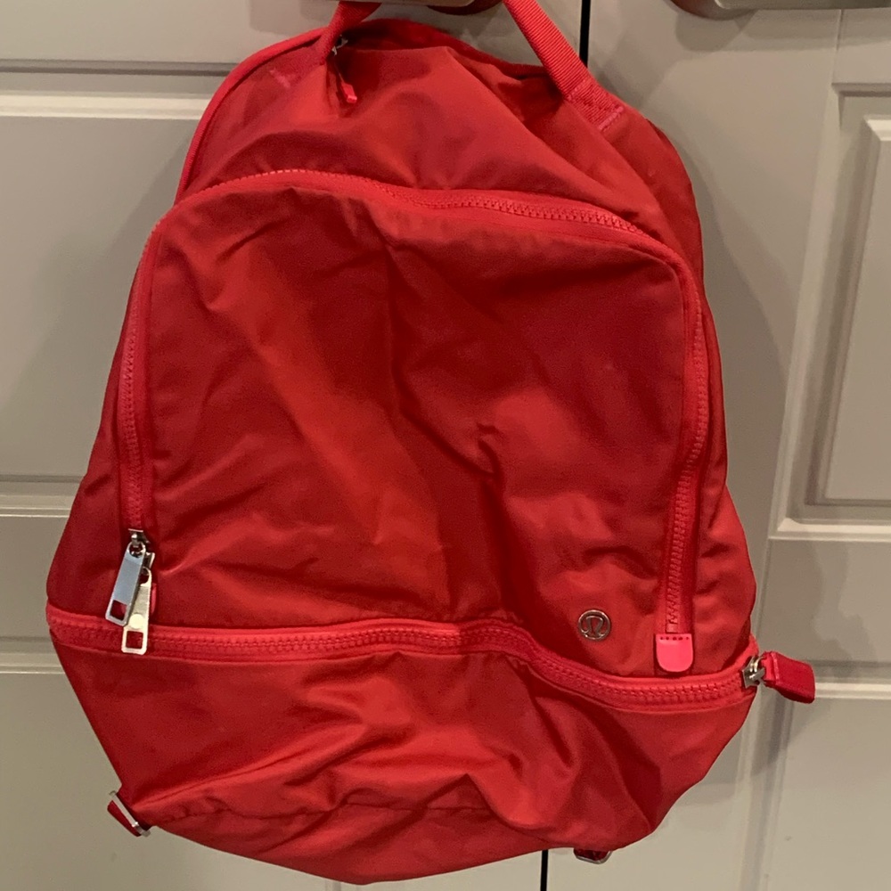 Bright red-pink Lululemon Backpack